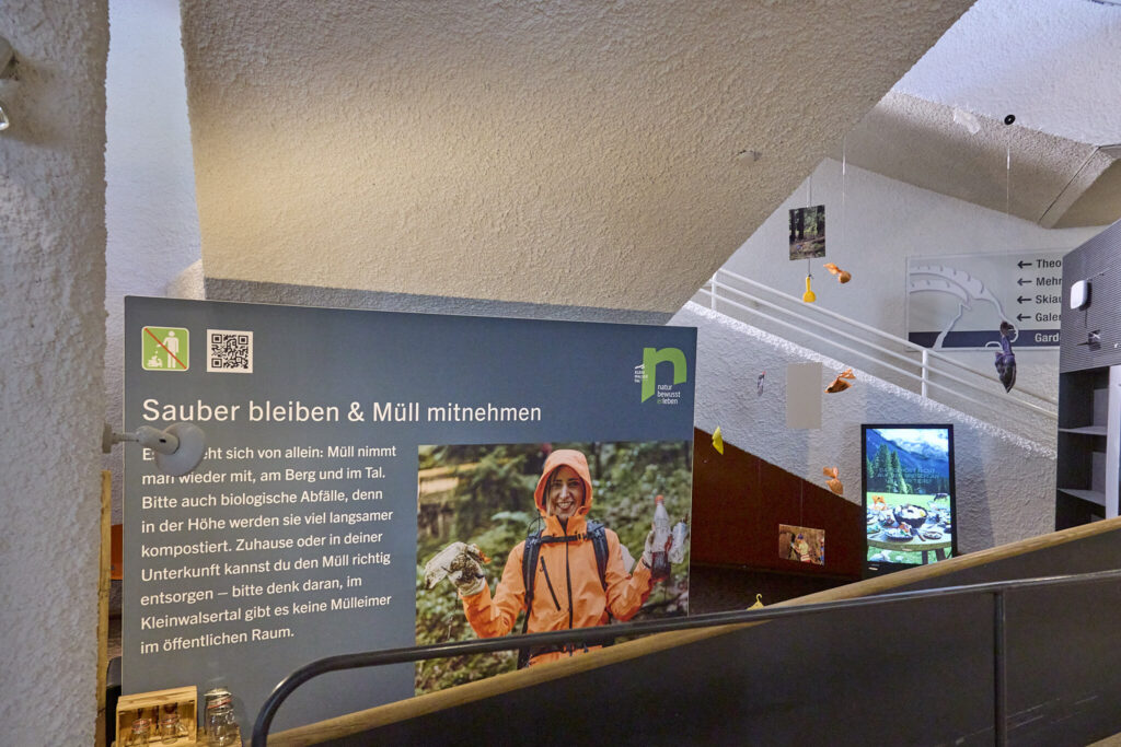 Sauber bleiben und Muell mitnehmen exhibition panel with the trash mobile installation, Walserhaus Hirschegg